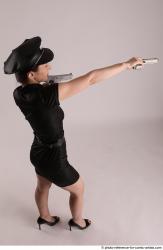 NIKITA POLICEWOMAN WITH TWO GUNS